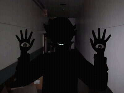 Person Silhouette With One Eye And Fire Exit Sign GIF