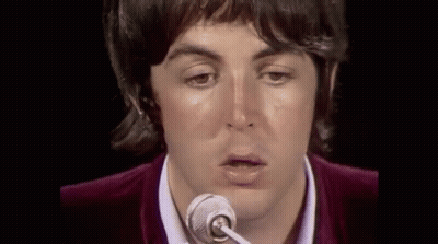 Person Singing Into Microphone GIF
