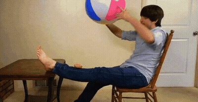 Person Sitting Cross-Legged on Floor
