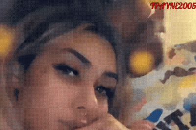 Person Sitting In Chair With White Pillow GIF