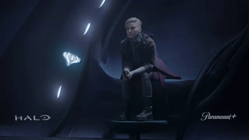 Person Sitting In Dark Room With Halo GIF