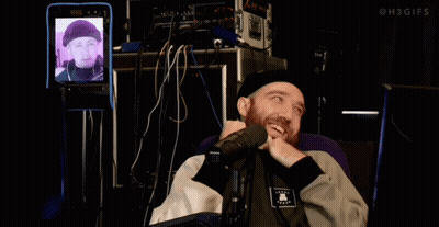 Person Sitting In Front Of Microphone GIF