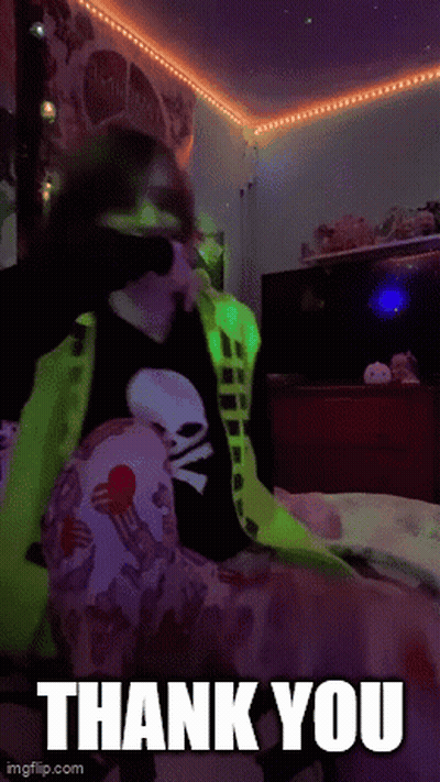 Person Sitting On Bed Saying Thank You GIF