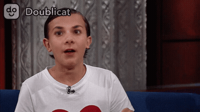 Person Sitting On Couch With Doublicat GIF