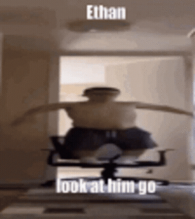 Person Sitting With Arms Outstretched Ethan Look At Him Go GIF