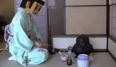 Person Sitting With Box On Head GIF