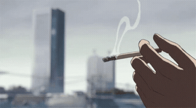 Person Smoking Cigarette In City GIF
