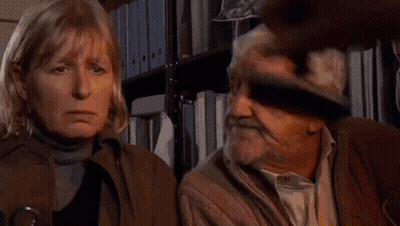 Person Stamping Letter L On Paper GIF