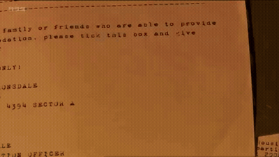 Person Stamping Paper Saying Leeds GIF
