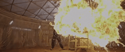 Person Standing Before Fireball GIF