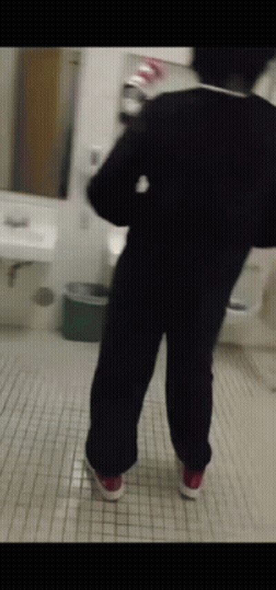 Person Standing In Bathroom GIF