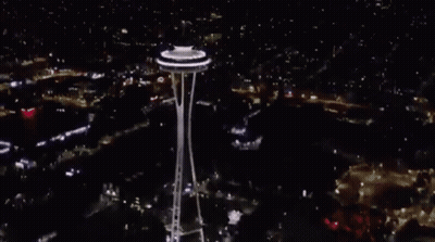 Person Standing In Circle Of Light GIF