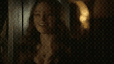 Person Standing In Dark Room With Flashlight GIF