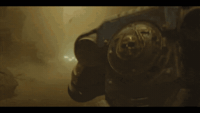 Person Standing In Dark Room With Light Coming Out Of Mouth GIF