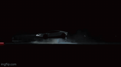 Person Standing In Dark Room With Smoke From Mouth GIF