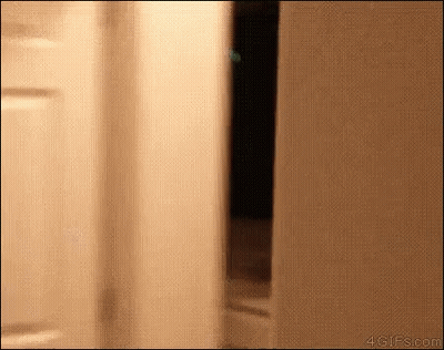 Person Standing In Doorway Blurred Background GIF