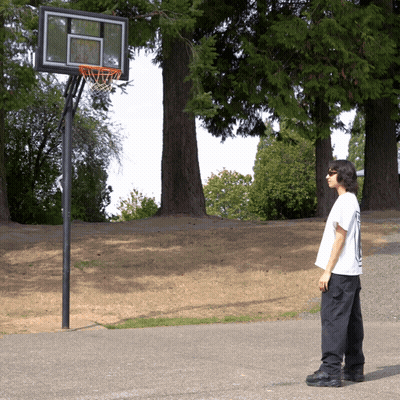 Person Standing In Front Of Basketball Net GIF