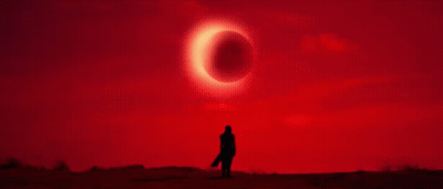 Person Standing In Front Of Crescent Moon GIF