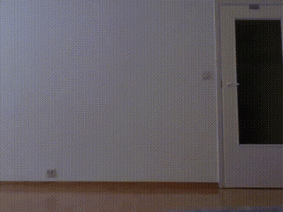 Person Standing In Front Of Door GIF