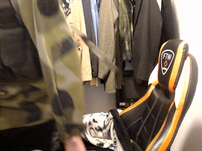 Person Standing In Front Of FTW Chair GIF