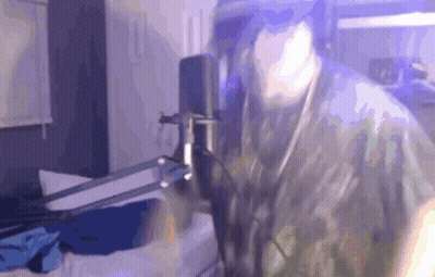 Person Standing In Front Of Microphone GIF
