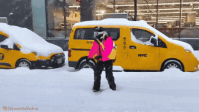 Person Standing In Front Of NYC Taxi GIF