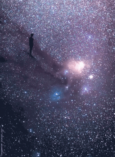 Person Standing in Galaxy