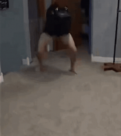 Person Standing In Living Room GIF