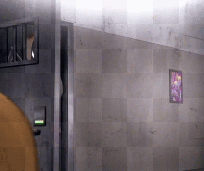 Person Standing In Prison Cell With Picture GIF