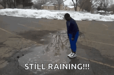 Person Standing In Puddle Saying Still Raining GIF