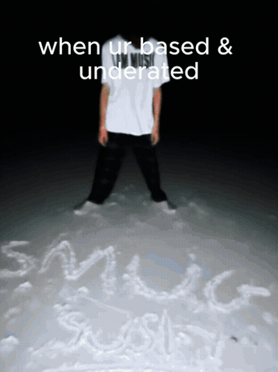 Person Standing In Snow With Music Written GIF