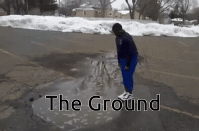 Person Standing In Water Puddle With Ground Text GIF