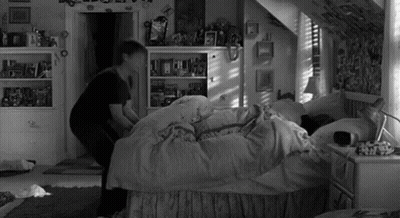 Person Standing Next To Bed GIF