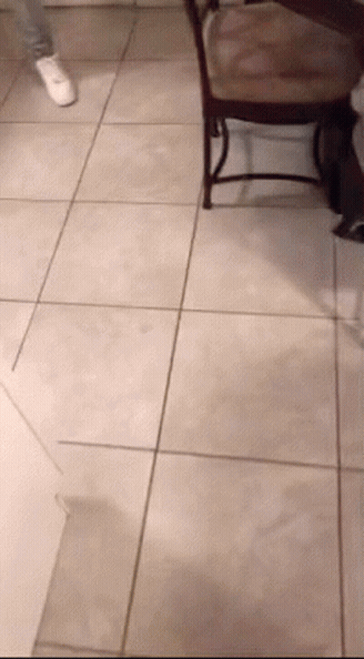 Person Standing Next To Chair GIF