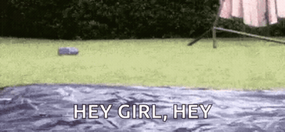Person Standing On Blanket In Yard With Water Bottle GIF
