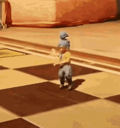 Person Standing On Checkered Floor GIF
