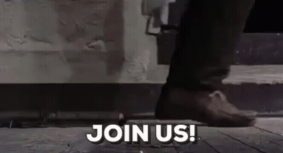 Person Standing On Sidewalk Saying Join Us GIF