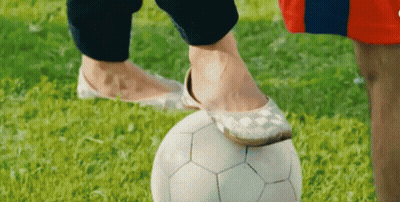 Person Standing On Soccer Ball GIF