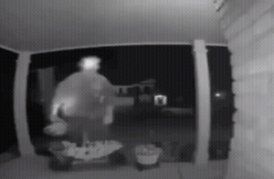 Person Standing Porch at Night
