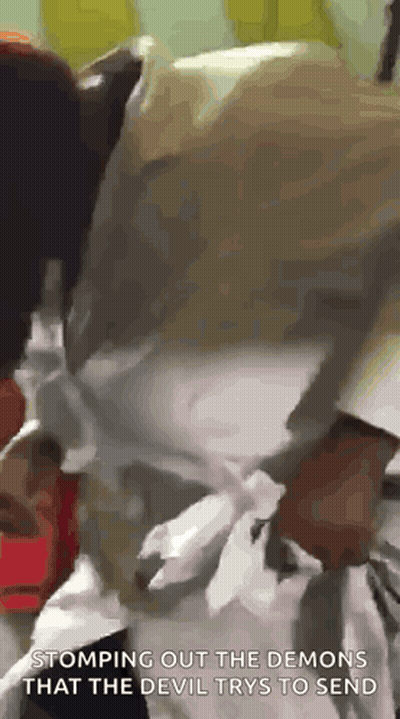 Person Stomping Out Demons From Devil GIF