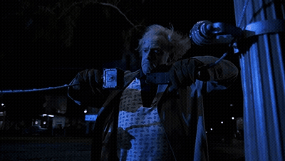 Person Struck By Lightning In Dark Room GIF