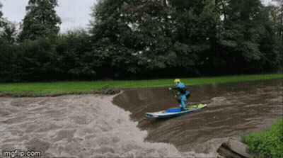 Person Surfing In River GIF