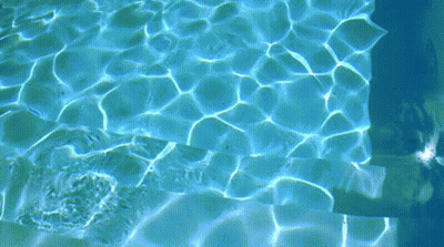 Person Swimming In Blue Pool GIF