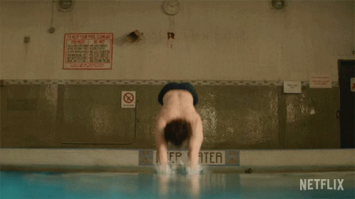 Person Swimming In Pool With Netflix Logo GIF
