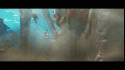 Person Swimming Underwater With Trees GIF