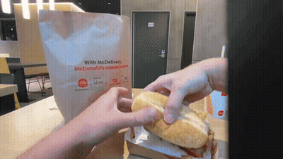 Person Taking McDonald's Sandwich Out Of Bag GIF