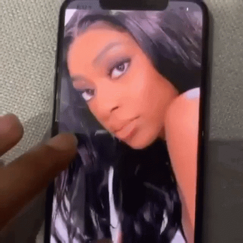 Person Taking Picture Of Woman On Cell Phone GIF