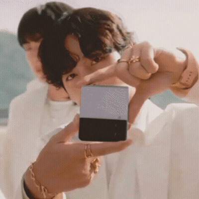 Person Taking Picture With Cell Phone GIF