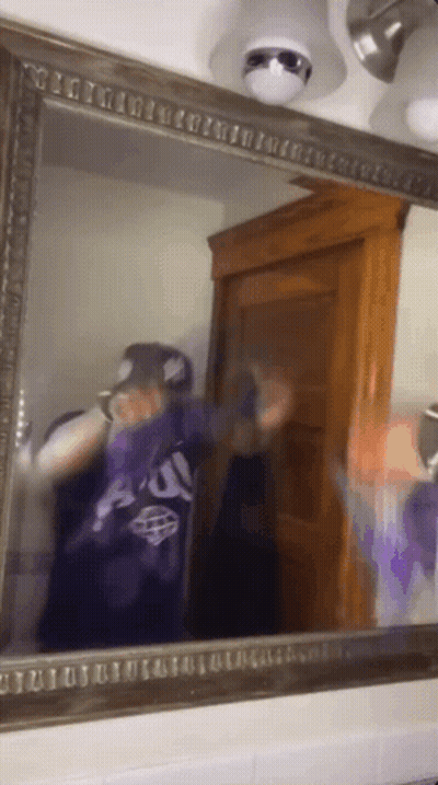 Person Taking Selfie In Mirror Wearing Au Shirt GIF