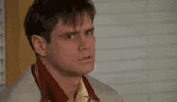 Person Talking Nonsense To Jim Carrey GIF